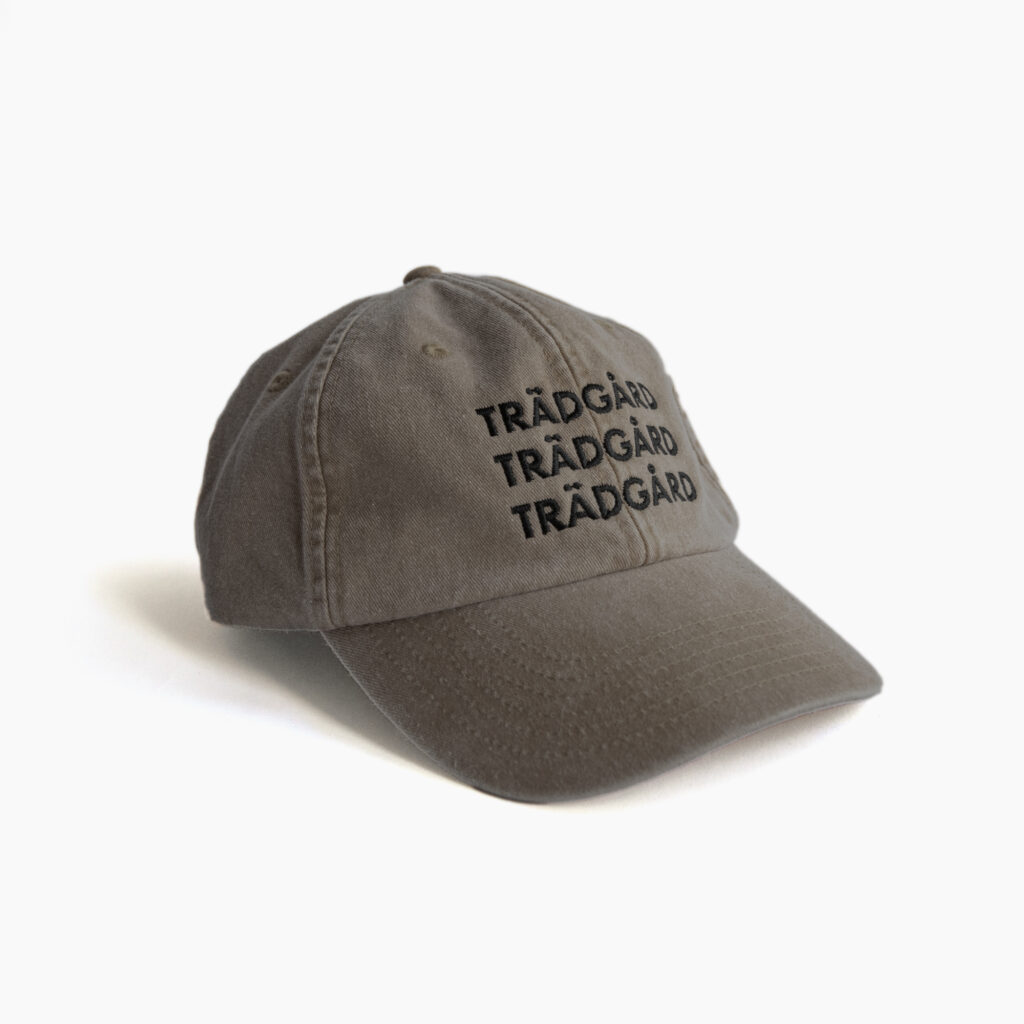 Tygkeps i vintage dad cap-stil. Brun